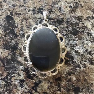 Black and silver pendant